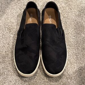 Olukai Black Slip-On Pehuea Pa’I Shoes